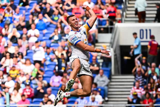 Leeds Rhinos captain Ash Handley celebrates scoring one of his hat-trick of tries in the Magic Weekend win against Bradford Bulls. Picture by Olly Hassell/SWpix.com.