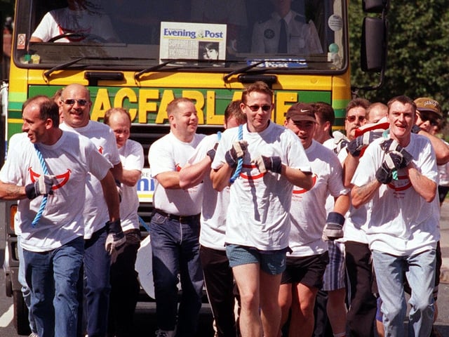 A truck pull makes its way from The Globe pub in August 1999 to raise money for the Victoria Lee Smile Appeal.