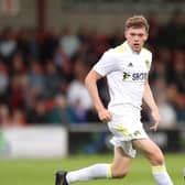 FLEETWOOD, ENGLAND - JULY 30: Jack Jenkins of Leeds United runs with the ball during the Pre-Season Friendly match between Fleetwood Town and Leeds United at Highbury Stadium on July 30, 2021 in Fleetwood, England. (Photo by Lewis Storey/Getty Images)