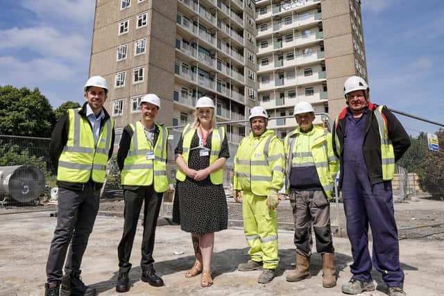Business development manager at Connell Brothers, Gerard Kelly, left, is accompanied by chief officer of housing Gerrard Tinsdale, second left, Councillor Jessica Lennox, centre and site operatives (Photo: James Pawlowski)