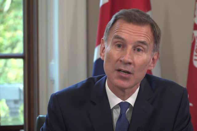 Chancellor Jeremy Hunt speaking to the nation from the Treasury in London. Picture: Marc Ward/PA Wire