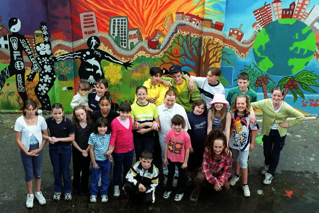 Children on the Marlboroughs - the small estate in Leeds - painted a mural on derelict garages with the help of an artist.