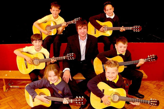 A donation of guitars to the school got the spotlight in 2006. Does this bring back memories?