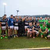 Both sets of players get together after Hunslet's win in the 2023 Harry Jepson OBE Memorial Trophy tie. Picture by Craig Hawkhead/Leeds Rhinos.