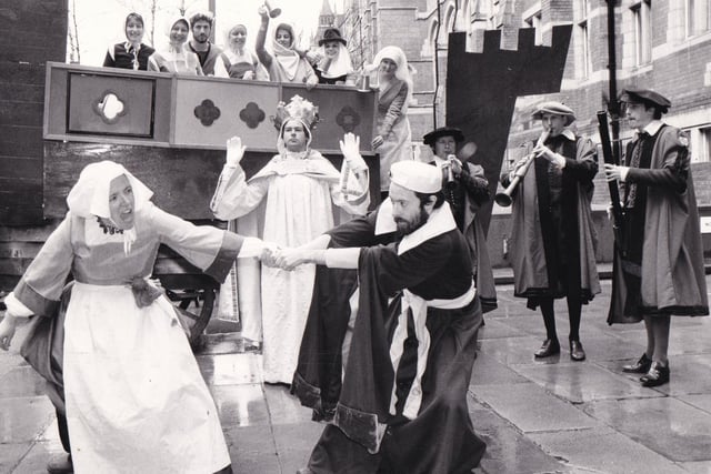 Actor Paul Valois was struggling to get his wife (Pam Davies) to stay in the picture at this Leeds University enactment of the Brotherton Players production of 'Play of Noah' in April 1983. But was tussle was only in jest. Paul, who played Noah, was pushing out this ark at the start of the three-day Leeds Renaissance Festival.