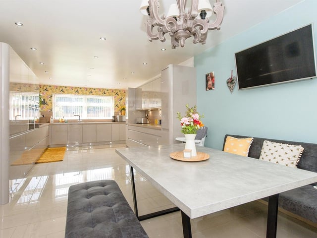 A full view of the sleek dining kitchen.