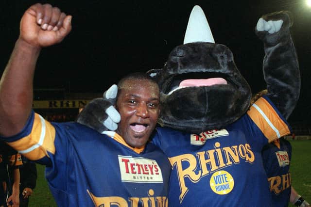 New mascot Ronnie Rhinos seen with player Anthony Farrell in 1997. Ronnie stoopd as a candidate in that year's general election, polling 56 votes.