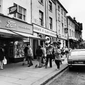 A street scene showing Boots, the Army and Navy stores and the Studley Royal pub/hotel in August 1973.