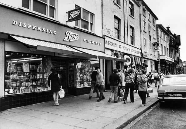 A street scene showing Boots, the Army and Navy stores and the Studley Royal pub/hotel in August 1973.