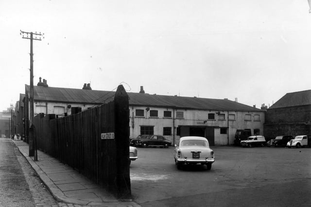Holm Street is visible on the left edge of this view from August 1958. Moving right is the car park of Central Motor Auctions.