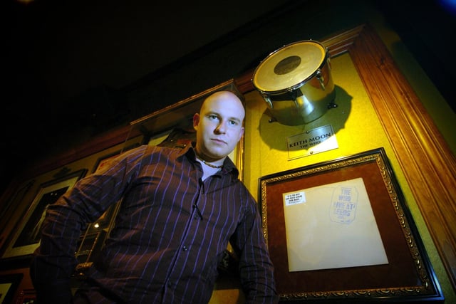 Assistant general manager Richard MacKay is pictured in February 2006 with the original record sleeve of The Who's 'Live at Leeds' album and the drum skin used on the record by drummer Keith Moon.
