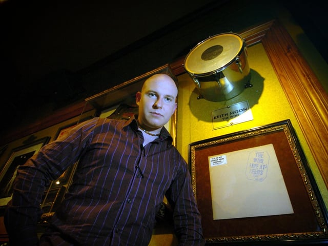Assistant general manager Richard MacKay is pictured in February 2006 with the original record sleeve of The Who's 'Live at Leeds' album and the drum skin used on the record by drummer Keith Moon.