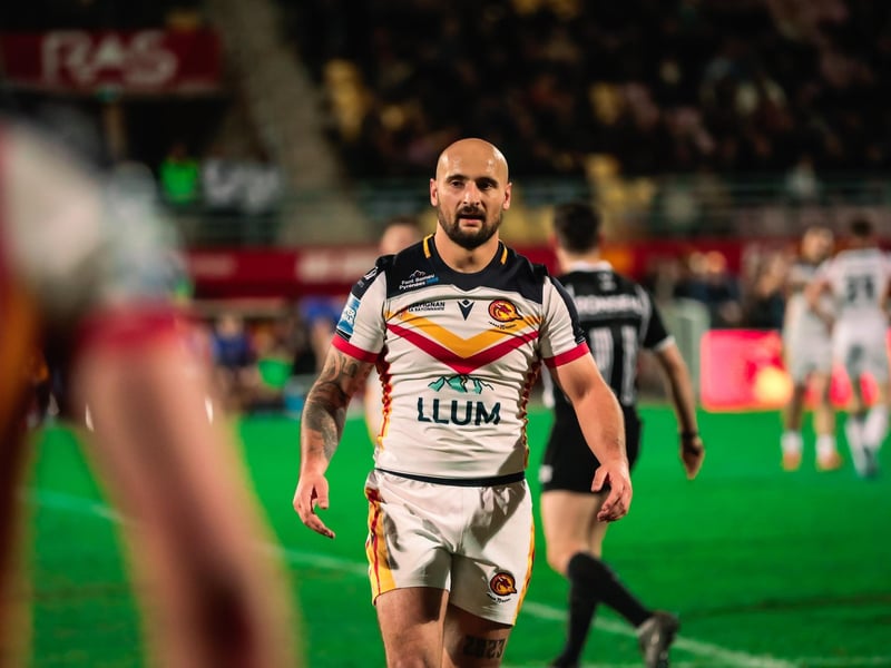 Grade B late contact on passer, three penalty points, total points 3.75 - fine.