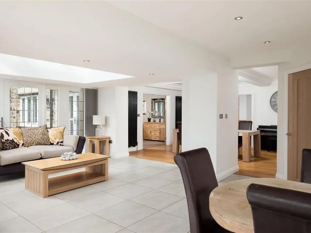 The kitchen is well-positioned for easy access in to the laundry room, a pantry and into the double garage, which has electric remote controlled garage doors
