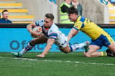 Matty Russell seen scoring for Wakefield Trinity against Warrington Wolves last season. Picture by Alex Whitehead/SWpix.com.