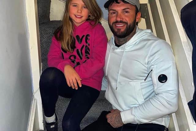 Chris with his niece Jorgie who he affectionately called 'little legs'