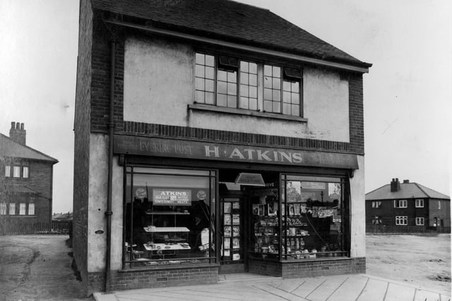 The shop of Harry Atkins on Middleton Park Road. Range of goods on sale, including bread and cakes, sweets, newspapers and tobacco. Pictured in April 1936.