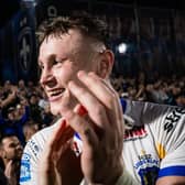 Harry Newman celebrates with Leeds Rhinos' fans after the win at Wakefeld Trinity. Picture by Alex Whitehead/SWpix.com.
