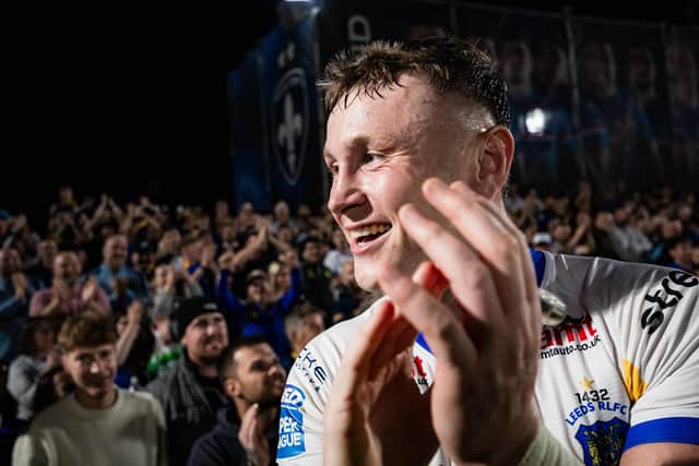 Harry Newman celebrates with Leeds Rhinos' fans after the win at Wakefeld Trinity. Picture by Alex Whitehead/SWpix.com.