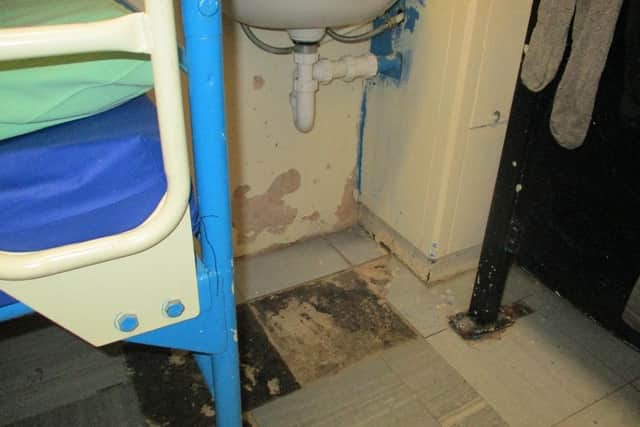 The report found that some first night cells were 'grubby and unwelcoming'