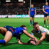 Chris Hankinson scores Leeds Rhinos' equalising try - setting up Jake Connor's winning goal - in Leeds Rhinos' 24-22 victory at Wakefield Trinity. Picture by Alex Whitehead/SWpix.com.