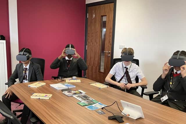 Young people get the chance to use special virtual reality headsets