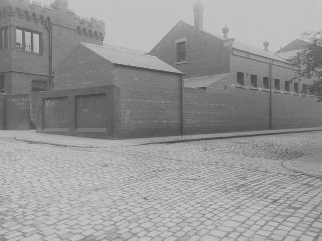 The junction of Fenton Street and Carnaby Street looking east, showing headquarters of Territorial Force, 1st West Riding Brigade Royal Field Artillery at 27, Fenton Street. Paving Stones and stone sets in foreground. Pictured in August 1913.