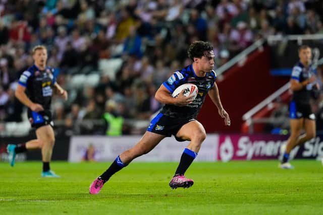 Brodie Croft races away to score the decisive try for Leeds Rhinos at Leigh Leopards. Picture by Olly Hassell/SWpix.com.