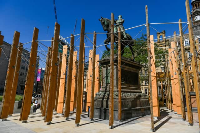Making A Stand, a sculptural 'forest' comprising approximately 127 seven-metre-high timber fins from Douglas Fir Trees has taken root in the public square opposite Leeds railway station and the Queens Hotel. Photo: James Hardisty