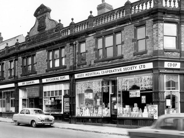 The Armley branch of the Leeds Industrial Co-operative Society Ltd pictured in June 1965. It features dry cleaning and the butchering department.