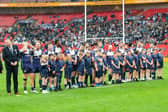 Featherstone Rovers players and mascots line up at Wembley before this year's 1895 Cup final. Picture by Allan McKenzie/SWpix.com.