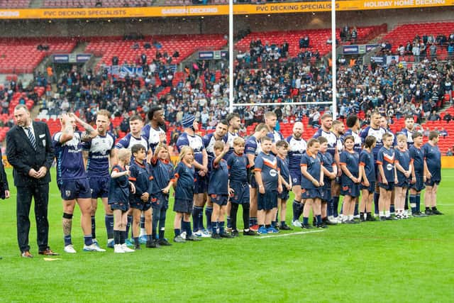 Featherstone Rovers players and mascots line up at Wembley before this year's 1895 Cup final. Picture by Allan McKenzie/SWpix.com.