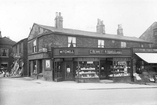 Harrogate Road at the junction with Regent Street in April 1936. The stone built shops are C.B.Mitchell, chemists and C.Smiths fruiterers and greengrocer. There is an Ironmongers shop in Regent Street.
