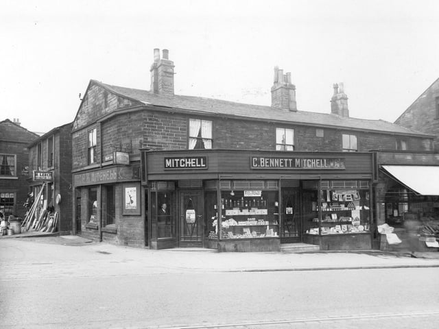 Harrogate Road at the junction with Regent Street in April 1936. The stone built shops are C.B.Mitchell, chemists and C.Smiths fruiterers and greengrocer. There is an Ironmongers shop in Regent Street.