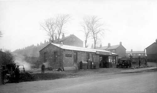 Grove Lane garage and petrol station in November 1930. Houses on the right Bentley estate can be seen.