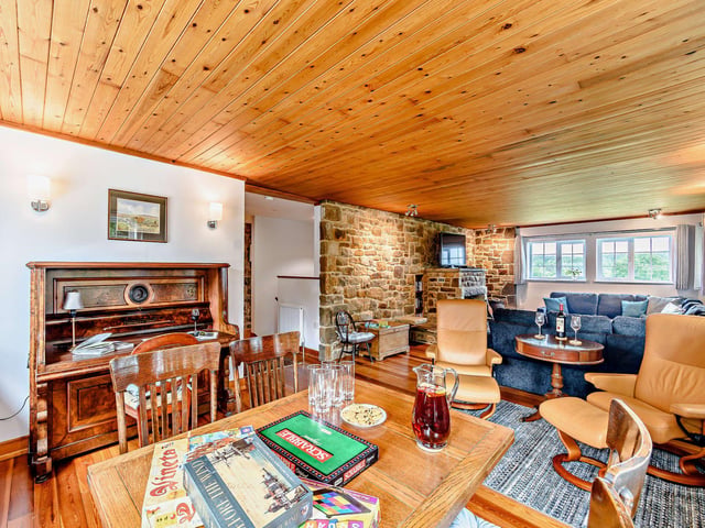 The Blue House is an eight-bedroom country house with large gardens and a games barn.