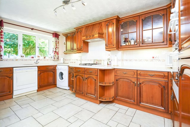 There is also a solid wood fully-fitted kitchen with a gorgeous tiled floor.