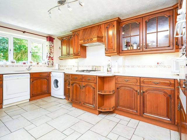 There is also a solid wood fully-fitted kitchen with a gorgeous tiled floor.