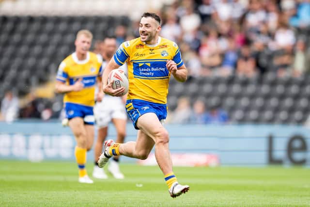 Leeds Rhinos' Jake Connor on his way to scoring against Hull FC last month. Picture by Allan McKenzie/SWpix.com.