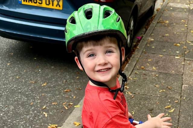 Zach, now aged 3, enjoying his new hip