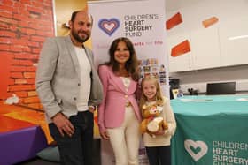 The personal monitoring devices from the Children's Heart Surgery Fund will give families the peace of mind away from the unit. From left, charity trustee Colin Clewes, Lea Ziff, and young patient Bella Rodgers.