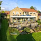 A view of the impressive property from the rear gardens.