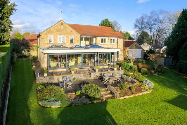 A view of the impressive property from the rear gardens.