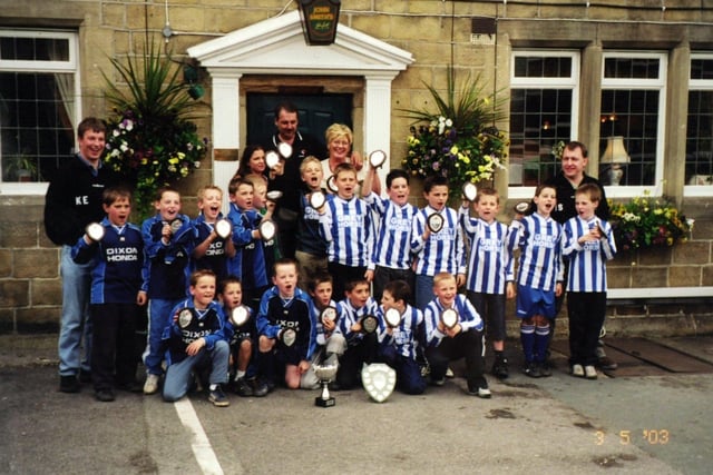 July 2003 and Guiseley Dynamos celebrate becoming U-10s Harrogate and District League champions for the first time in the club's history.