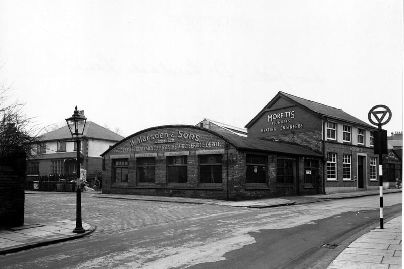 The junction St Michael's Lane and St Michael's Grove in July 1951 showing the business premises of Jas. J. Nicholson, upholsterer, Herbert Morfitt and Son, plumbers and heating engineers and W. Marsden & Sons, motor engineers.