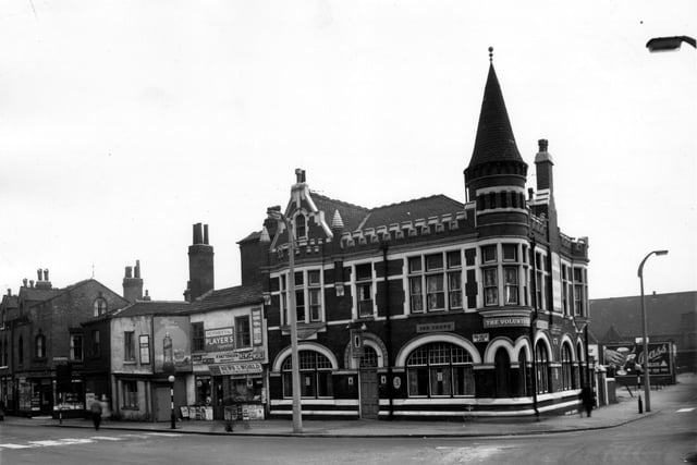 The Volunteer pub on Holbeck Lane pictured in March 1965. To the left is P. Pattenden's newsagents also selling greetings cards and stationery. On the right edge Domestic Street can be seen.
