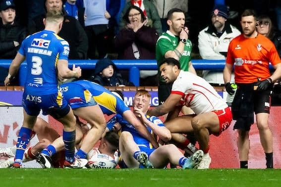 Leeds Rhinos and St Helens meet at AMT Headingley on Friday for the second time in eight days. Luis Roberts is seen scoring in last week's Super League clash which Rhinos lost 18-8. Picture by Allan McKenzie/SWpix.com.