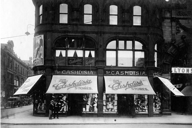 Cashdisia Stores on corner of Vicar Lane with Queen Victoria Street ( now the site of Victoria Quarter ). County Arcade can be seen. Pictured in June 1932.
