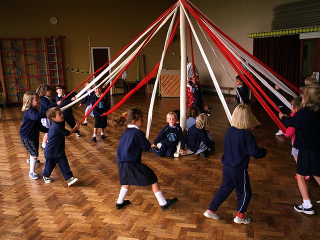 Maypole dancing at Ireland Wood Primary School in June 1999.