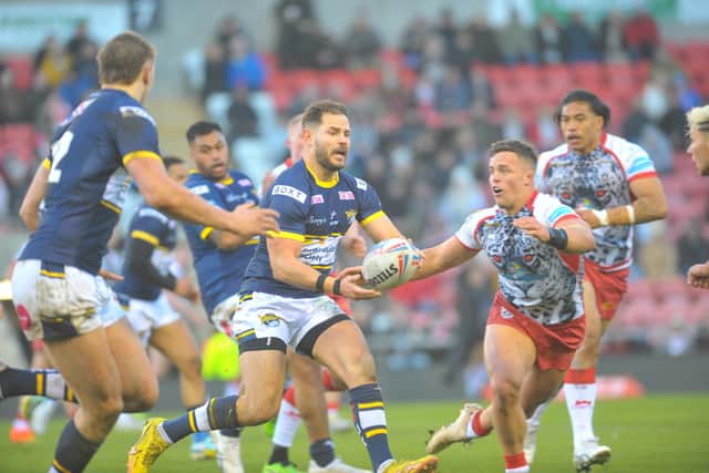 Aidan Sezer in action for Rhinos in their pre-season defeat at Leigh. Picture by Steve Riding.
